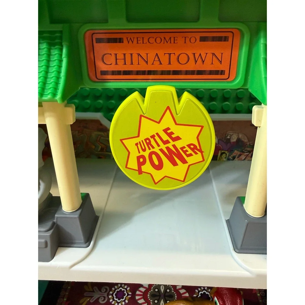 TMNT Half-Shell Heroes Chinatown Playset with Raphael and Dinosaur Figures